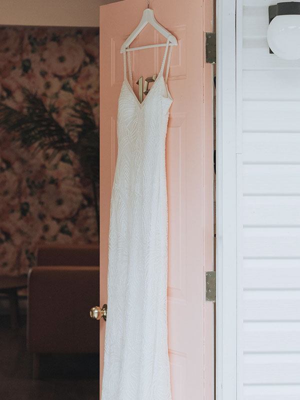 Revelle Bridal Styled Shoot at Revelle Bridal dress on pink door