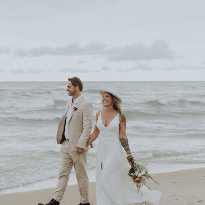 Revelle Bridal Styled Shoot at June Motel walking on beach