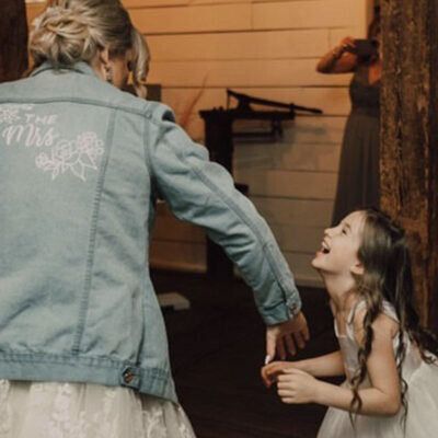The Mrs and flower girl The Mrs Bridal Jacket at Revelle Bridal - Buy or rent
