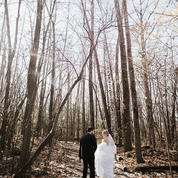 Bride & Groom - Walking in the fall forest - Revelle Bridal