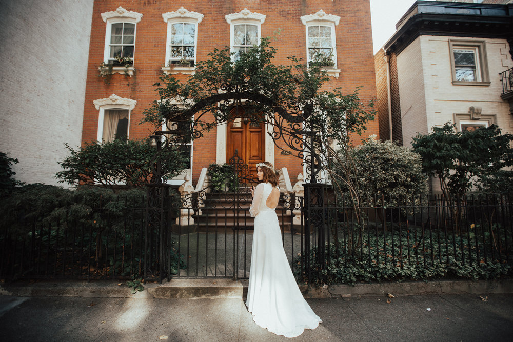 Bride in front of brownstone