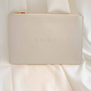 Bride hold everything clutch perfect gift accessory for modern brides revelle bridal shop