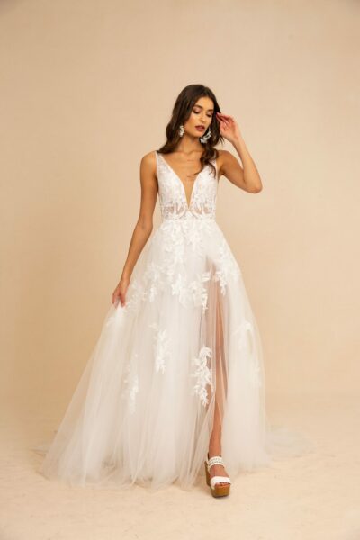 Giuletta by Tara Lauren is available for purchase at Revelle Bridal Tulle aplique lace wedding gown