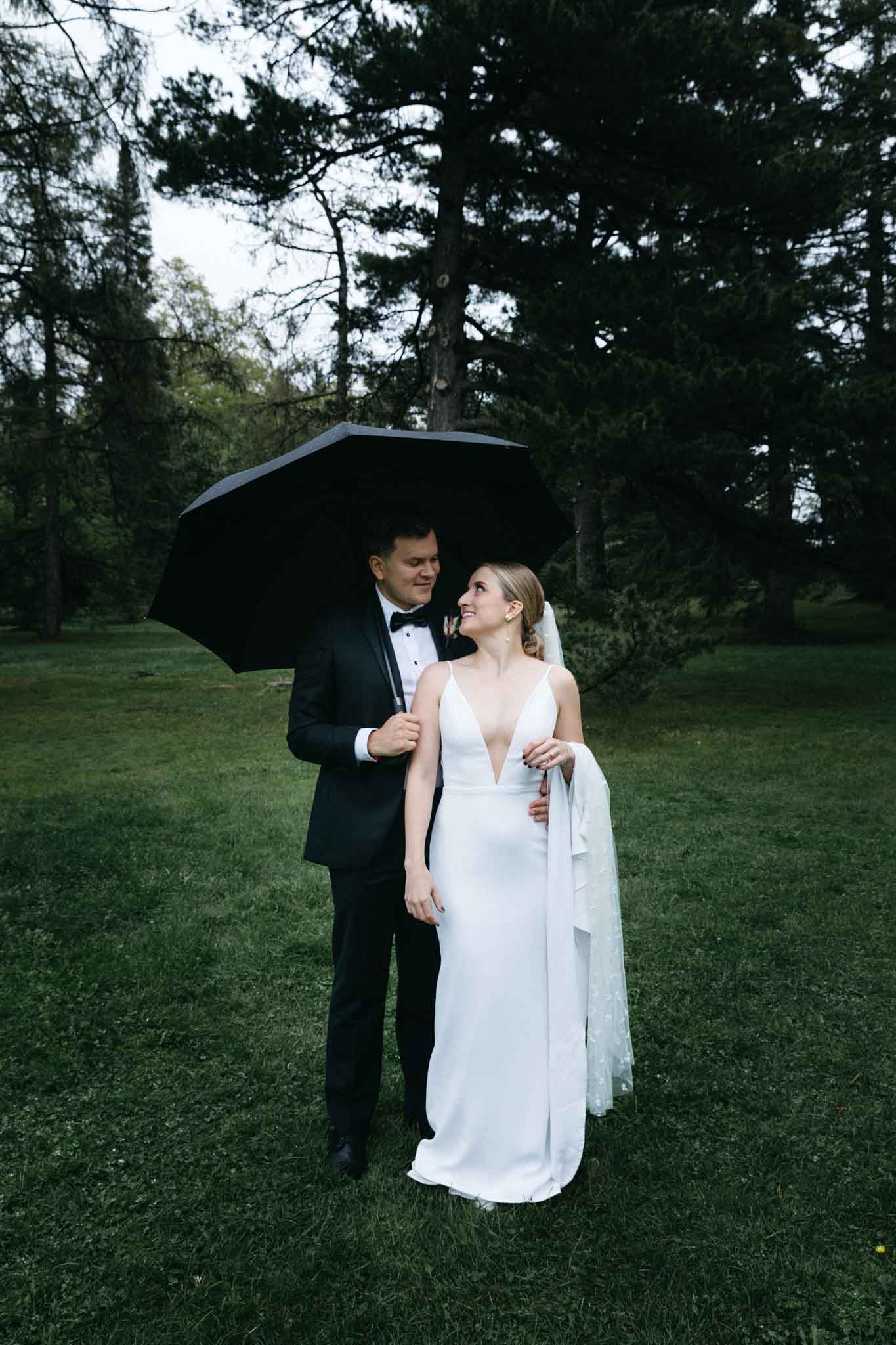 Age of Indie Alyssa Kristin Real Brides Revelle Bridal couple under umbrella