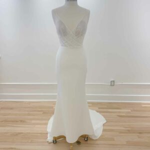 Mila Crepe Made With Love available for purchase at Revelle Bridal sample on mannequin