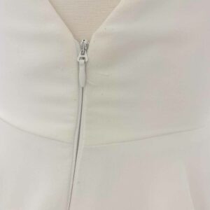 Orenda by Aesling crepe wedding modern wedding dress sample sale revelle bridal on mannequin zipper
