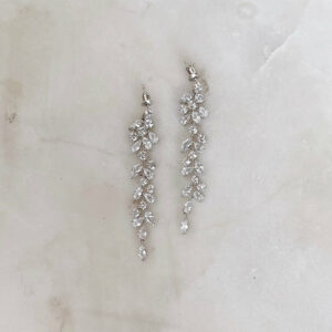Trixie Crystal Drop Earrings Untamed Petals available for purchase at Revelle Bridal Beautiful crystal drop earring with sparkling CZ stones