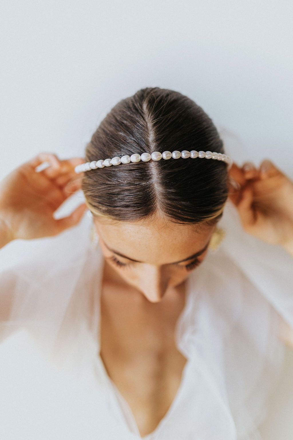Logan Pearl Headband by Untamed Petals available for purchase at Revelle Bridal Hair Accessories in Ottawa
