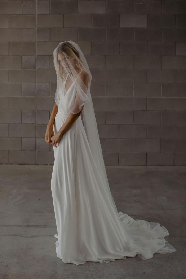 https://revellebridal.com/wp-content/uploads/2022/02/carly-veil-full-revelle-bridal-mwl-made-with-love-accessories-wedding-veil-modern-cathedral-soft-tulle-elegant-veil-blusher-face-cover.jpeg