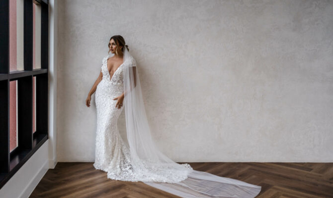 Made With Love Designer Feature Bride Model Wearing Darcy Lace Wedding Gown with Long Cathedral Veil