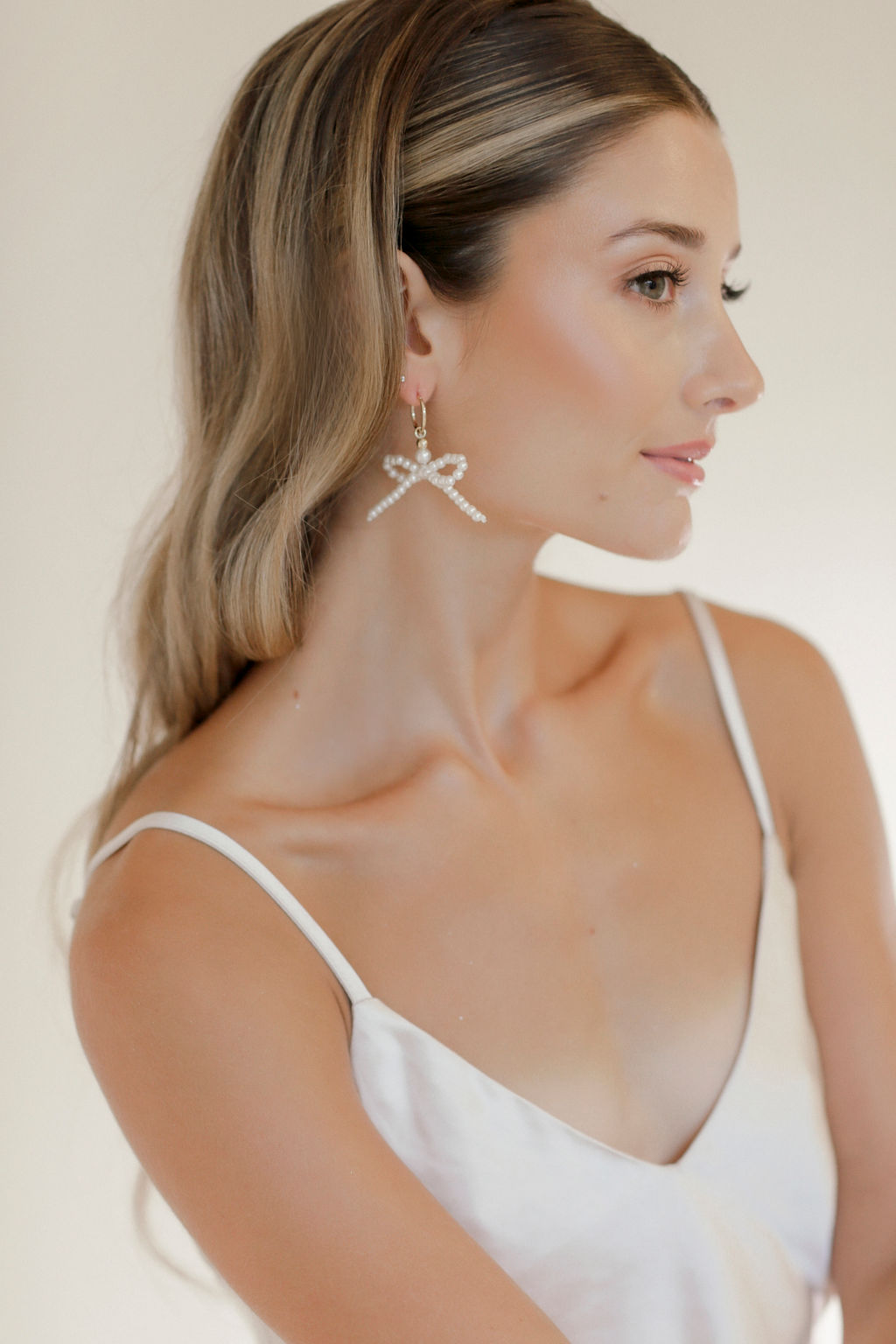 Brierwood Bow Earrings by BLVD by Revelle Bridal Jewelry Wedding Pearl Bows Modern Accessories Model