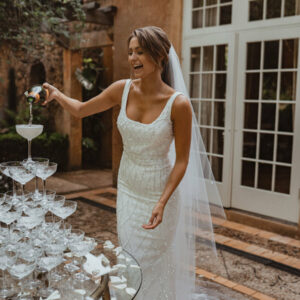 Anna Campbell River wedding dress - Hand beaded details, square neckline, train, fitted silhouette - Sample wedding dress at Revelle Bridal