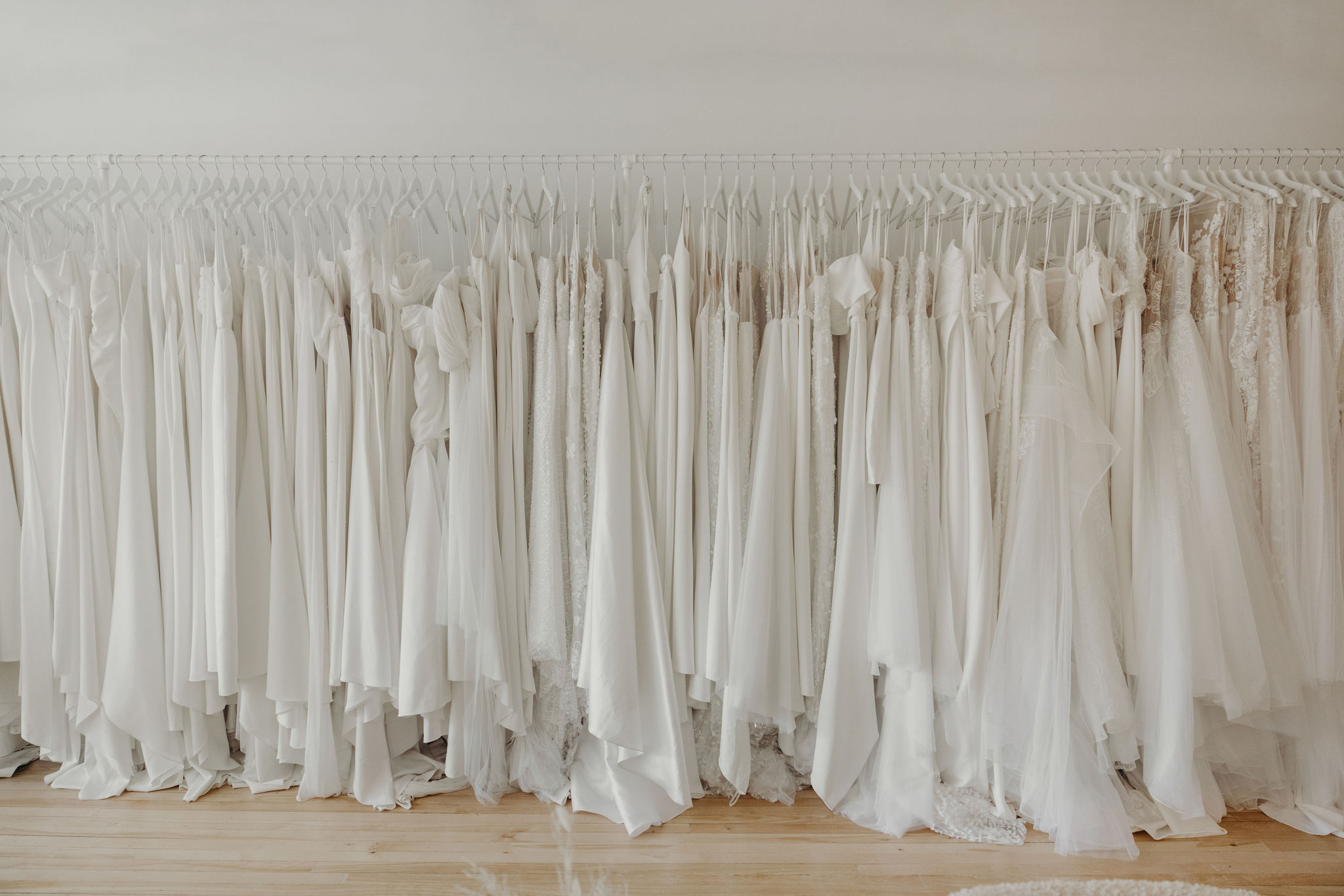 Revelle Bridal Boutique Wedding Dress Rack - Our Designers - Wedding Gowns Bridal Collection